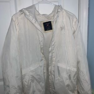 White windbreaker